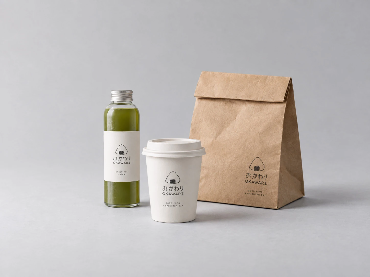 Japanese green tea, a takeaway cup and a kraft paper bag